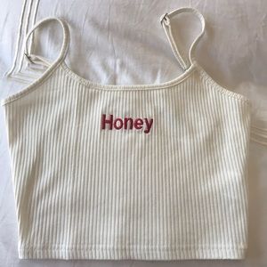 white “honey” cropped tank